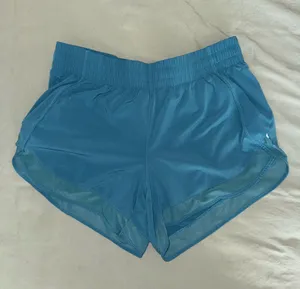 Athleta Mesh Racer Teal Women's 4 inch Shorts thumbnail 1