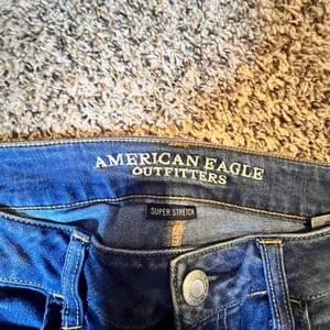 American‎ Eagle Super Stretch Jeggings Womens 8 Long Medium Wash Blue Slim Denim thumbnail 2