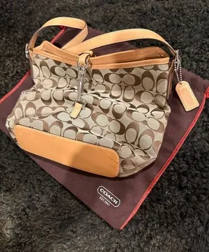 Classic coach pattern handbag in brand new condition thumbnail 1
