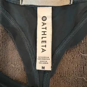 Athleta green fitness tank top size medium. thumbnail 4