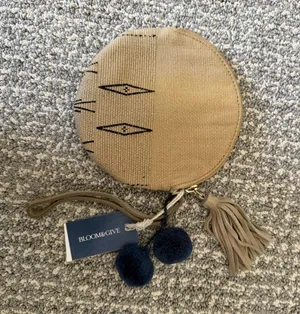 Bloom & Give Tan Round Mini Wristlet with Tassel & Pom Pom’s thumbnail 1