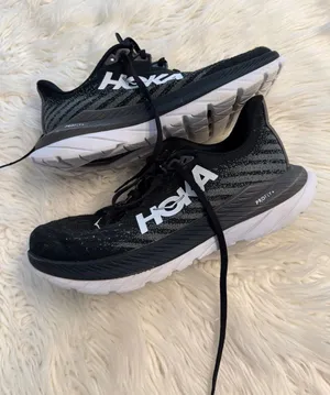 Hoka Black and White Athletic Running Shoes size 8B good condition thumbnail 1