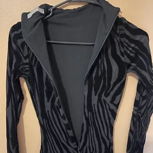 Pre loved Naked Wardrobe Black Tiger print catsuit thumbnail 2