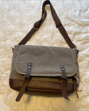 Greg Norman Collection Taupe and Brown Canvas Messenger Tote thumbnail 1