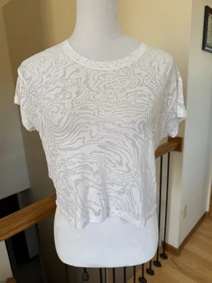 Lululemon All Yours Crop Tee in a white swirl sheer pattern thumbnail 1
