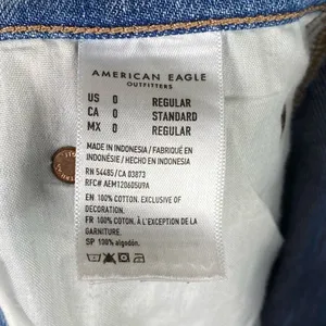 American Eagle Vintage Light Wash Distressed Denim Baggy Jeans Size 0 thumbnail 6