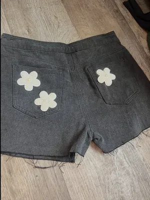 POL black denim skort features distinctive pearl-embellished flower details thumbnail 8