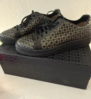 Alaia Black Leather Sneakers with Gold Cutout Pattern Size 11 thumbnail 1