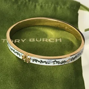 NWOT Tory Burch Gold and Cream Floral Bracelet thumbnail 4