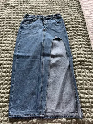 High-waisted wide-leg blue denim skirt with a distressed look. Size: S #denim #highwaisted #distressed thumbnail 1