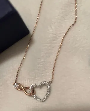 Swarovski Rose gold and silver infinity heart necklace thumbnail 5