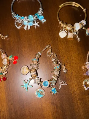 Set of 5 charm bracelets 4 gold 1 silver thumbnail 3