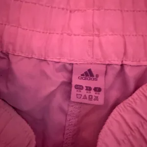 adidas Women’s Blue, Green & Yellow Printed Athletic Shorts thumbnail 4