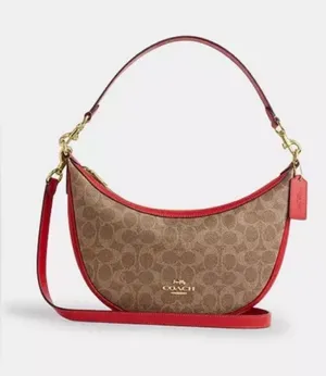 Coach Outlet Aria leather Shoulder Bag in Signature Canvas in red and brown / basically new thumbnail 1