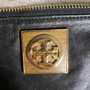 Tory Burch Black and Gold Clutch with Leather Finish and Zipper Closure thumbnail 2