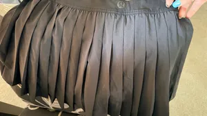 Lululemon The lighting isn’t the best but this is a black skirt with no fading and tag intact with no wrinkle thumbnail 1