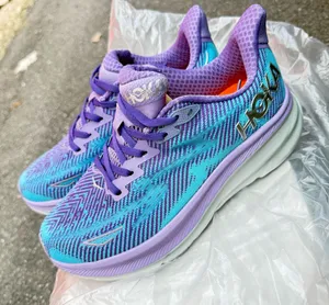 Hoka One One Clifton 9 running shoes in purple and blue with a gradient effect #running #athletic women size 7 thumbnail 1