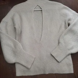 Max studio sweater size small in light cream color . Adorable opening on back thumbnail 1