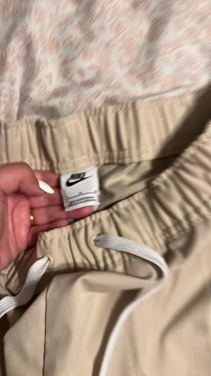 Men’s Nike woven tapered pants thumbnail 4