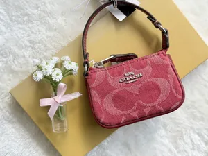 NWT Coach Mini Nolita Bag Charm In Signature Denim Silver/True Red CDB23 thumbnail 1