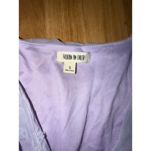 Fashion on Earth Lavender Swiss Dot Sleeveless Ruffle Hem Mini Dress Purple S thumbnail 2