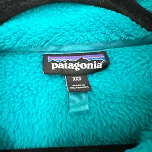 Patagonia Women's Re-Tool Snap-T Pullover in a teal XXS outdoor hiking casual thumbnail 2