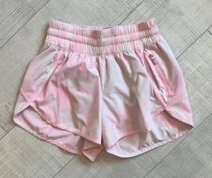 Pink and white track that Lululemon Shorts thumbnail 1
