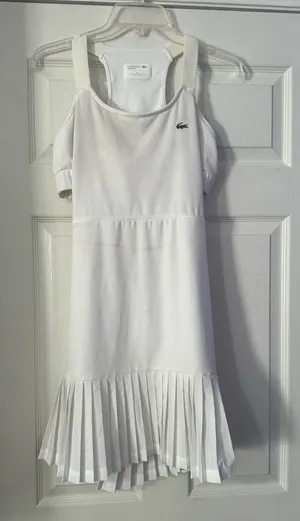 Lacoste Sport racerback tennis dress with a pleated hem is a size 10. thumbnail 1