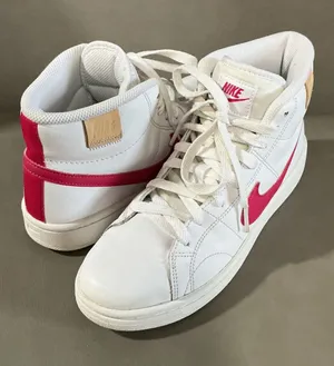 Nike Women's White Sneakers with Pink Swoosh High-Top thumbnail 1