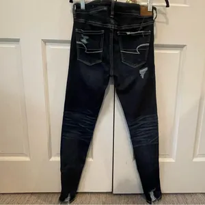 Women's American Eagle Distressed Dark Denim Skinny Jeans thumbnail 3
