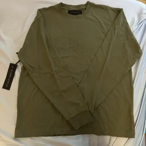 Aritzia super world army green long sleeve shirt thumbnail 1