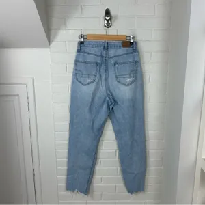 American Eagle Light Wash Distressed Curvy Mom Jean Size 4 thumbnail 10