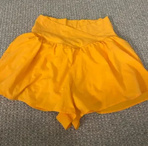 Aerie OFFLINE neon orange crossover shorts thumbnail 1