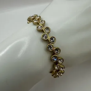 Gold tone and rhinestone bangle bracelet thumbnail 5