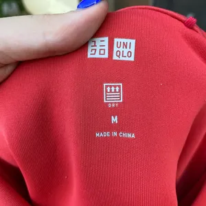 Uniqlo Size medium red hoodie slightly cropped dry fit thumbnail 2