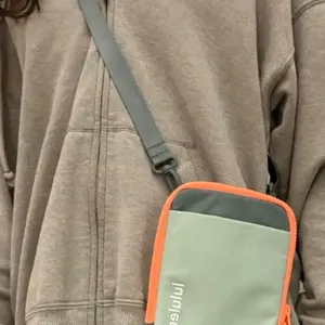 Lululemon easy access crossbody orange green bag travel casual bag thumbnail 6