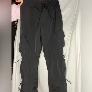 Like New The Chloe Nylon parachute pants by Garage size small in black, sold out thumbnail 7