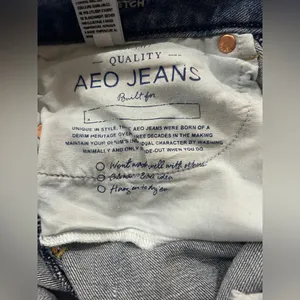 American Eagle jeans distressed skinny stretch low rise med wash thumbnail 3