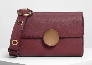 NWT Charles &‎ Keith Burgundy Circular Push Lock Crossbody Bag thumbnail 1