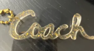 Coach Clear Bag Charm with Gold Glitter Script Charm thumbnail 1