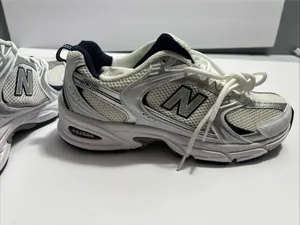 New Balance women’s sneakers in white and navy. Clean and stylish design with a comfortable cushioned insole and lace-up closure. Made in Vietnam. Size 9 US (40.5 EU / 25.5 CM). Great for everyday wear, walking, or casual outfits. Excellent condition thumbnail 12