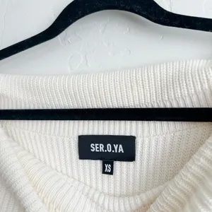 Ser.o.ya | Everleigh‎ Distressed Knit Off-Shoulder Mini Dress in Winter White thumbnail 7