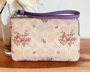 NWT Coach Corner Zip Wristlet In Signature Canvas With Floral Print‎ thumbnail 1