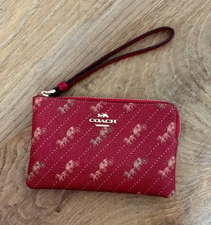 COACH Corner Zip Wristlet With Horse and Carriage Dot Print thumbnail 1