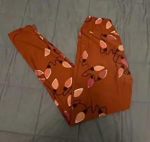 Lularoe brown leggings with pink and orange light bulb design #loungewear thumbnail 1