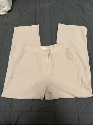 Tan high-waisted trousers with a relaxed fit. Size: 10 #highwaisted #trousers thumbnail 2