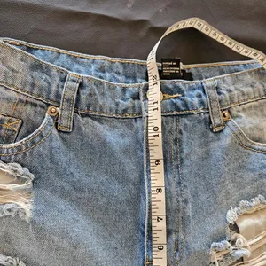 Forever 21 Distressed High-Waisted Denim Shorts Size 30 thumbnail 5