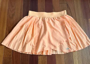 Alo Orange Pleated Tennis Skirt thumbnail 1