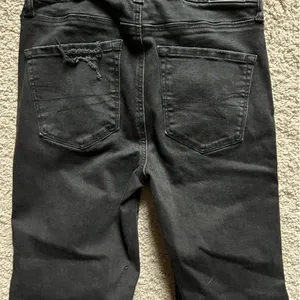 American Eagle Outfitters Black Skinny Jeans with Distressed Knees thumbnail 4