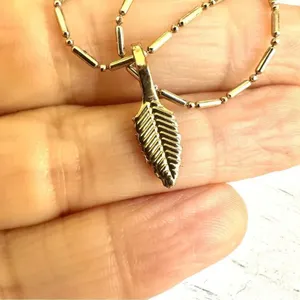 Long gold tone double chain small leaf pendant thumbnail 3